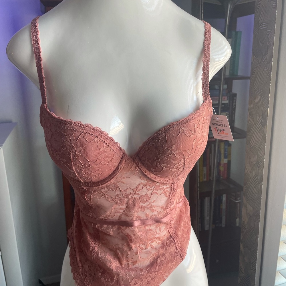 Pink lingerie corset body suit